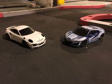 After seeing how removing the wing worked on the Audi, figure give the Porsche a try. It’s been developing a roll over issue.    Could not see the dark blue NSX. Little sandpaper and it’s got a new look. 