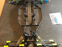 Comes with front and rear yellow wheels only , no tires , 