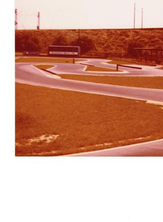 This is a picture of Weisbaden club's RC Track in 1978-79.  It's actually across the Rhine in Mainz-Kastel and out of the way a bit.  I ran into a couple of Germans that were testing their car at one of the local supermart parking lots and they told me about the track.  I helped throw dirt around a bit when it was being built but couldn't afford to join their club on a LT's pay.