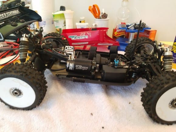 This is the electric powered, radio controlled, 1/8 scale
Mugen MBX7R ECO Off Road Buggy Kit.
Changes from the original MBX7 ECO include:
**New 16mm Shocks for better stability**
**Side angle of chassis changed to increase strength**
**Front axle position changed to trailing axle position***
**New steering Ackermann plate for better steering input**
**Shortened upper suspension arms for more camber adjustability**
**New front &amp; rear drive train &amp; universals for better performance**
on bumpy surfaces
**New wing mounts increase rear traction &amp; jumping abilities**
**Stronger heavy duty sliding motor mount**
FEATURES
Chassis: A7075 T6 aluminum 0.12&quot; (3mm) thick
Drive: Four wheel three differential shaft drive
Shocks: 16mm oil filled with 3.5mm shock shafts, hard anodized
aluminum bodies
Shock Towers: Front, 0.20&quot; (5mm) thick A7075 aluminum
Rear, 0.16&quot; (4mm) thick A7075 aluminum
Gearbox: Sealed, front and rear
Differentials: Planetary geared, straight cut conical gears
Motor Mount: Aluminum sliding type, heavy duty aluminum, anchored
with 4mm screws for extra strength
Transmission: Single-speed
Ball Bearings: Full set
Battery Tray: Designed for two 2-cell LiPo batteries in a staggered
mounting position, or a single 4 cell LiPo
Suspension: Pillow ball type with 0.20&quot; (5mm) A7075 aluminum
lower suspension mounts for optimized geometry
Body: Clear buggy type, cab forward design with raised sides for
increased rear traction
Spur Gear: 44 Tooth plastic
Pinion Gear: 14T steel
Camber Tie Rods: Adjustable, Camber describes the angle at which the
tires sit vertically, suspension arms shortened 1.6mm allowing
more camber adjustment
Steering Tie Rods: Adjustable, Caster/Toe-in is the angle at which
the tires point inward as viewed from above
Steering: Bell-crank type, with carbon graphite steering brace and
adjustable Ackerman. Ackerman describes the effect of the inside
front wheel turning faster than the outside front wheel during
turns. Newly designed Ackerman plate improves steering input
INCLUDES
Mugen MBX7R-ECO Off Road Buggy Kit with clear buggy body,
rear wing, decal sheet, window mask sheet, battery/ESC tray, spur
and pinion gears, and illustrated instrucion manual