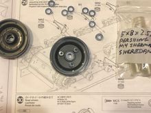 Jumped ahead because I was curious. I had a set of sealed bearings for some of my Tamiya tanks and found that the Centurion uses the same size bearings. 