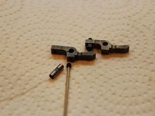 Saito FA-80T broken rocker with set screw compared with a rocker from an FA-91.