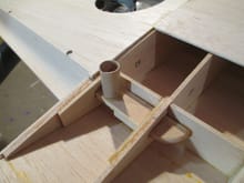 This "well" will serve to direct the nylon wing bolts through the wing and thread into the wing bolt block.