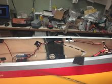 Wire from the ESC and Throttle Tech battery tap are routed along the side of the fuse.