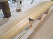 Liberally spread the mixture allowing it to wick into the balsa.  