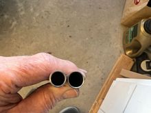 Here are the lower strut tubes.. VERY thin walled.  I made new ones some 4130 steel and got a little more wall thickness to help toughen them up.  look close: the one on the right is stock, left is my new one.