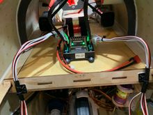 Starting the wiring. Rx Battery cables suspended from a releasable mount inserted into CB320. Control surface servo extensions are secured 
