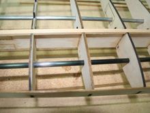 Close-up of carbon fiber rods and spruce spars