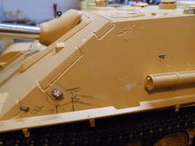 Loops , post handle to tube and used a burr to enhance the welds/armour plates.   