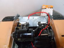 Cut out part of the lower hull and some thin styrene to cover up.