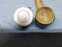 I found this higher compression piston, (on the left) that I acquired from Gary and installed in one of my 50's. Yours probably already has it.