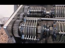 Before installing a spring between the discs