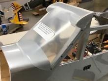 And here, the entire fuselage has been covered and the windshield temporarily installed. I'll take it off after the test flights for painting and removal of the protective covering.