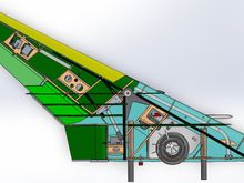 Outboard wing mated to the Inboard wing, with both upper wing skins removed so you can see some of the load path. The carbon rods of the Outboard wing are clamped to the Aluminum swing arm by 3 clamping screws accessed on the bottom side of the inboard wing. Wing is shown in the full swept aft position.