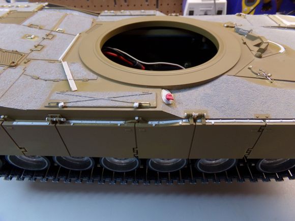 Tool box handles were replaced with Pershing handles since they haven't change the design since WW2.  Simulated padlocks added.  Exhaust outlet added.