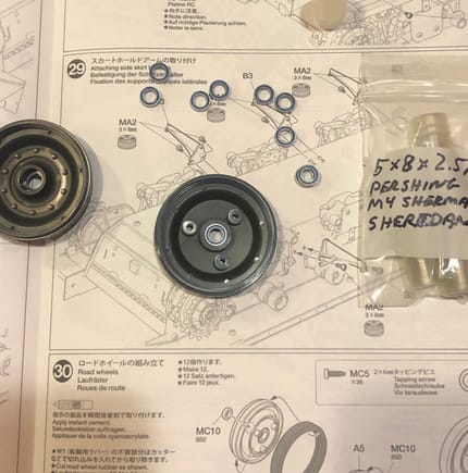 Jumped ahead because I was curious. I had a set of sealed bearings for some of my Tamiya tanks and found that the Centurion uses the same size bearings. 