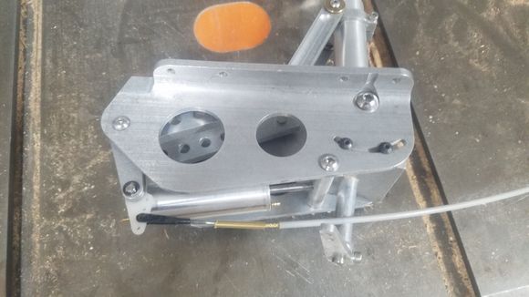 Will take some trial and error to get the travel correct but the gear arc is 1.5 ins and the door swings at the far end 2.5 ins. The flex copper cable makes the curve to the door with no issues. 