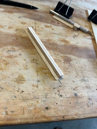 Here's the clip stock I made. I cut this into the 5 clips and glued to back of panel.