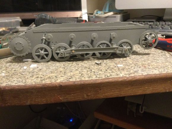 Sprockets and front road wheel, cut out the plastic spring and found a spring for suspension 