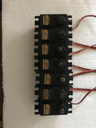 7 servos in pic but have 8 for sale. Can post a pic of all eight if necessary.