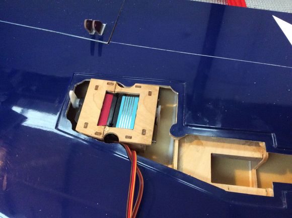 Doing this you can operate the flap servo and set up the linkage
