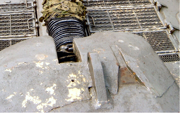 Faint line visible between the original turret & new armour - Centre