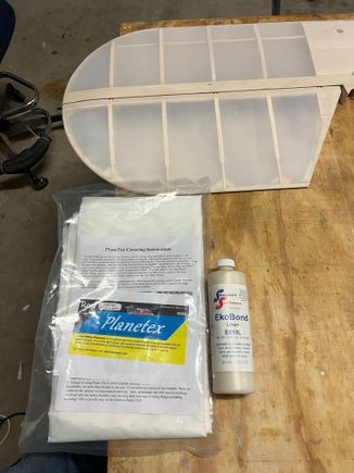 This is the cloth and glue I'm using.  It's water based, odor free and wonderful.  But wow, is it expensive!  Good news is a little goes a LONG way.