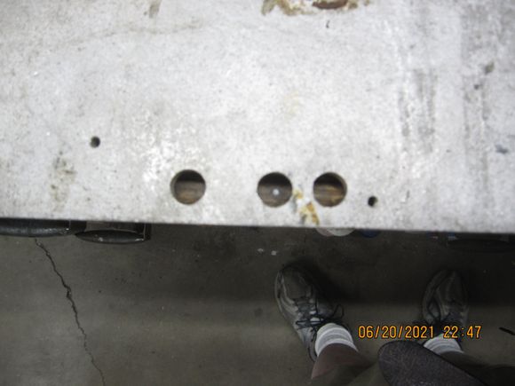 three large holes on the right side lower hull plate