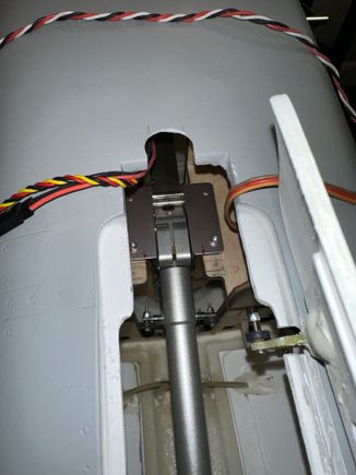 Semicircle relief cut / ground into rear of opening to allow the wheel to clear front of opening.