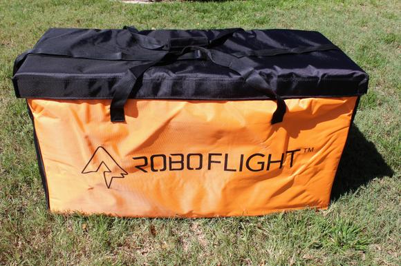 This bag has 2 hand straps and clip on shoulder strap to carry you wings and load them to the flying field.