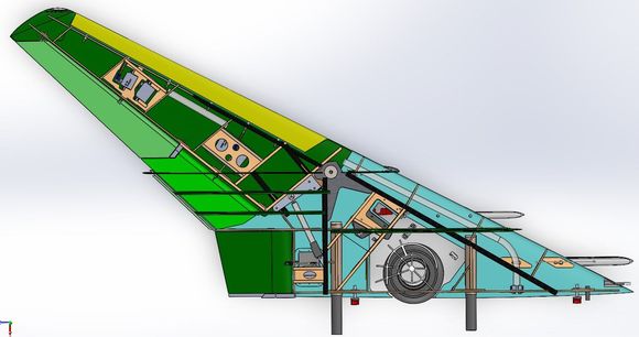 Outboard wing mated to the Inboard wing, with both upper wing skins removed so you can see some of the load path. The carbon rods of the Outboard wing are clamped to the Aluminum swing arm by 3 clamping screws accessed on the bottom side of the inboard wing. Wing is shown in the full swept aft position.