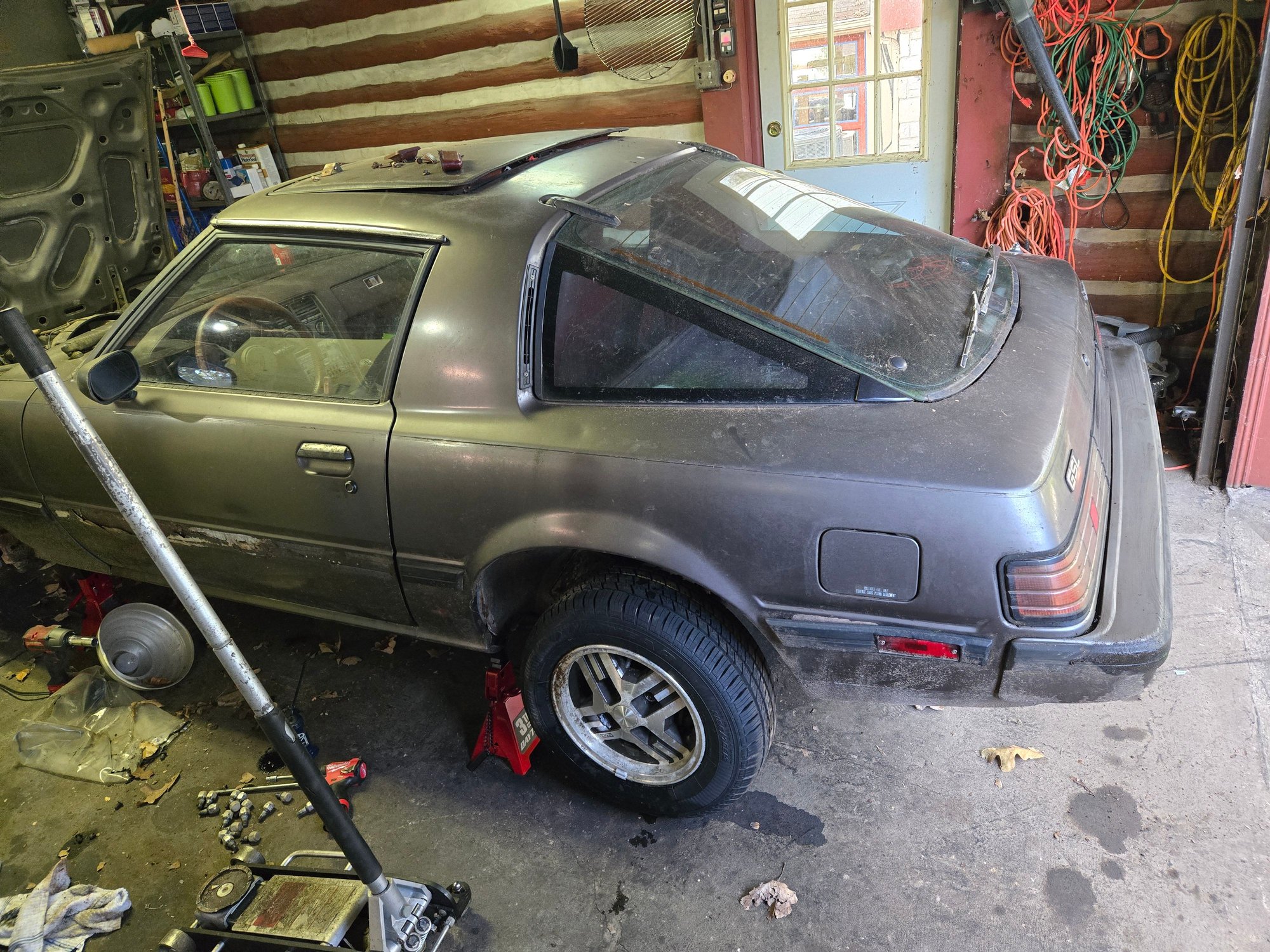 Already have it on jackstands for now, but threw a factory wheel back on for visual effect.