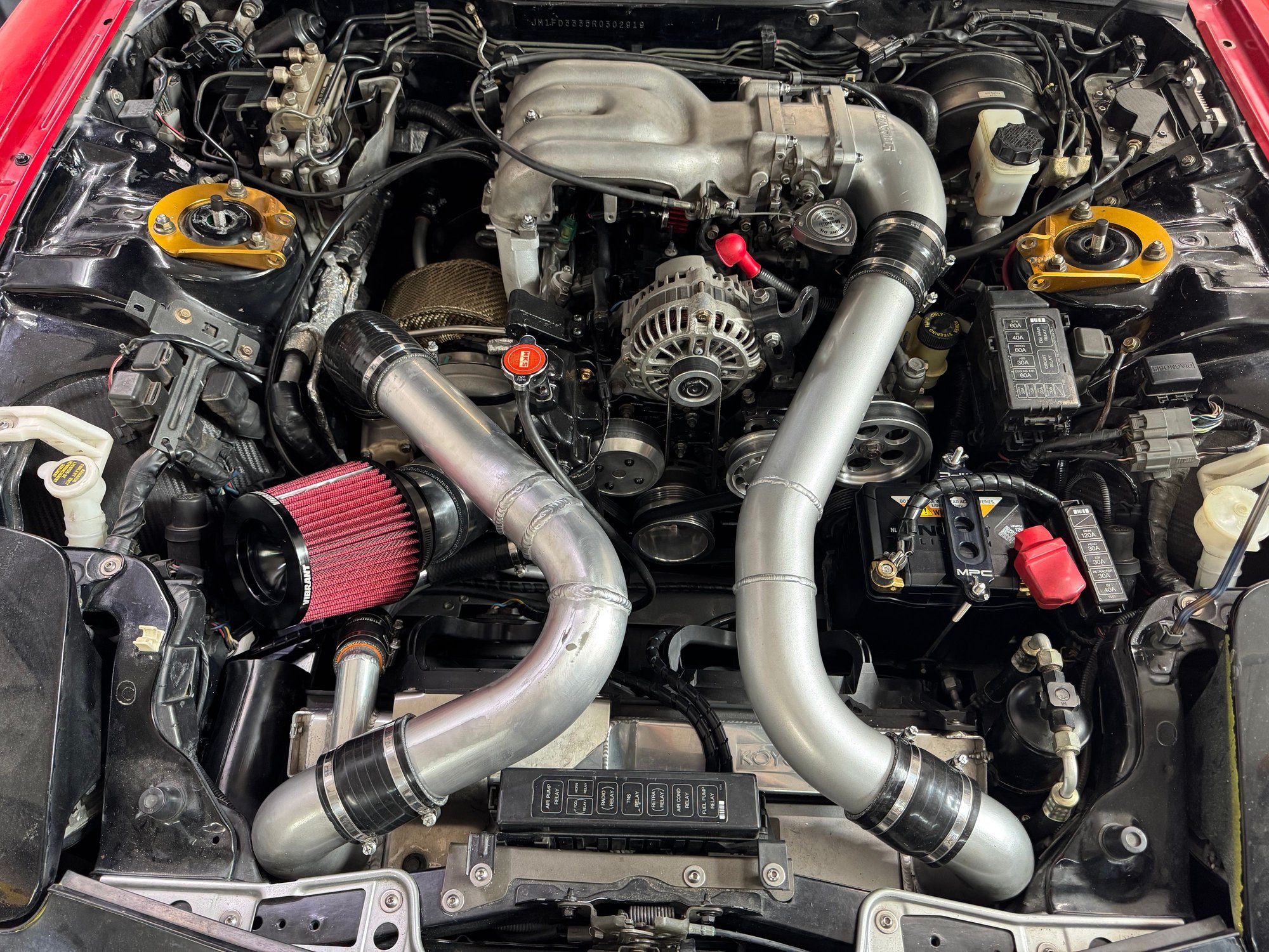 Overall shot of the engine bay.  IC pipe clamped in and good.  Still waiting to put the strut tower brace back on.