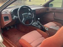 LOVE The red Interior. Slight fad on both seats.