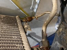 Rusted nuts to the AC Condenser