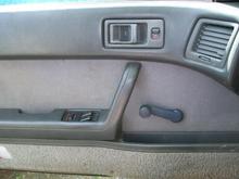 door panal with power, and manual window controls.