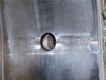 close up of the cracks around the spark plug holes
