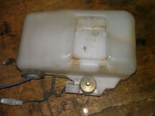Washer tank with wiring and motor and sensor