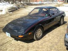 black with red velour interior.