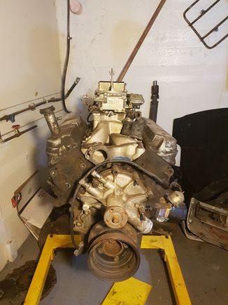 Engine on the stand with the new intake manifold and carb sitting on it. Soon be time to build this. I have a set of freshly rebuilt g40 heads too