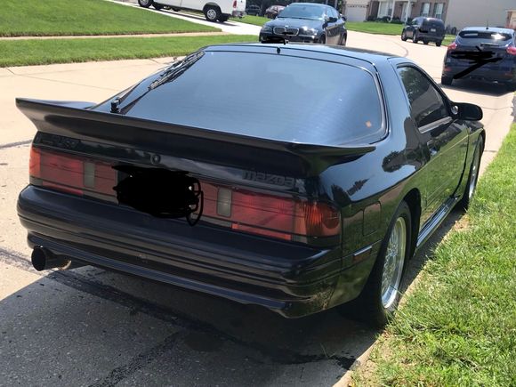 Correction it does cover up the 3rd break light. I also have had no leaks with this spoiler 