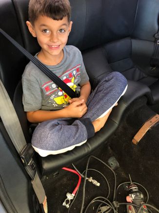 Back seats installed and test fit of my kid in the back. Yes!!!! I can pick up all 3 kids from school!!!