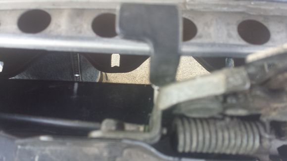 Here's a view looking straight down the hood opening from above, angled a bit towards the front bumper.