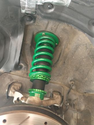 Here's the installed front left Flex-Z. I also ended up priming & painting (black) that roughly 2 inch patch where the plastic wore down to the metal, re-attached the liner with some new clip fasteners, and added some AL tape to detect future rubbing