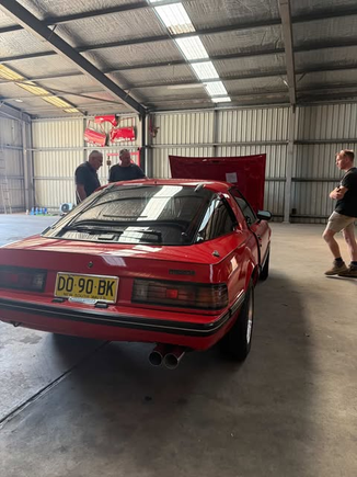Sitting in the workshop.