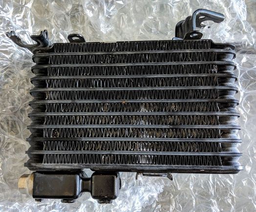 Dual oil coolers with dual oil cooler lines, clips and ducts - $300