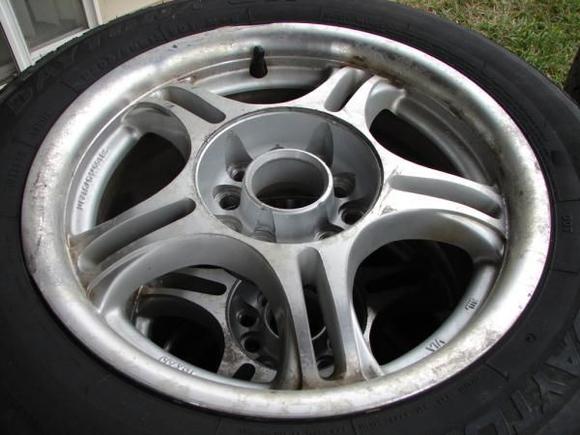 American Racing Estrella, 5x114.3
15x7  45

75$ for the whole set with 2 good tires &amp; 2 bad tires mounted.