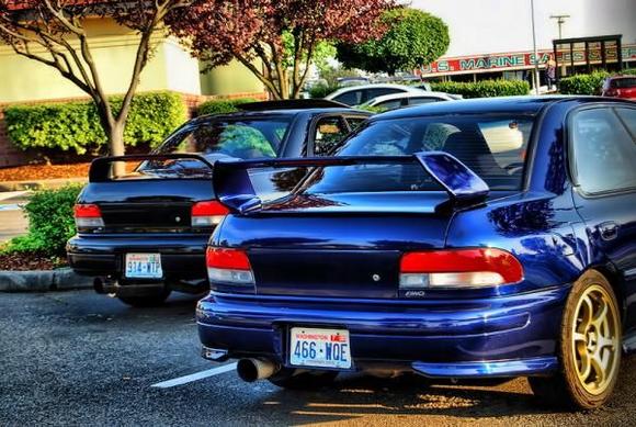 I own the black Impreza and the blue one is my fiance's car.