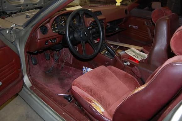 Original interior passenger seat and carpet are perfect. Driver seat is repairable