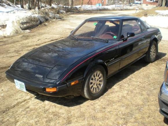 black with red velour interior.